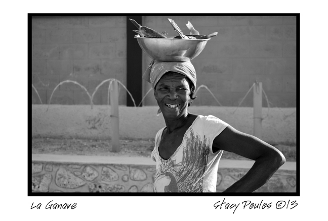 La Govave Haiti carrying fish on her head